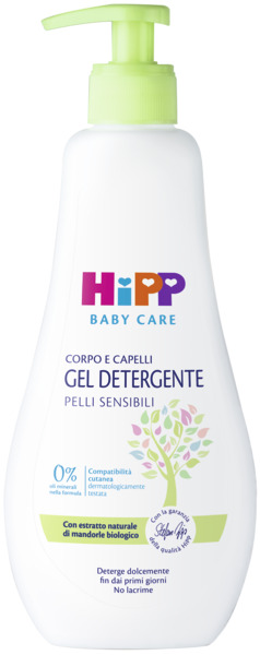 Un flacone bianco con un erogatore a pompa verde contiene un detergente gel per la cura dei bambini, etichettato in italiano, con una grafica di un albero e un'indicazione dello 0% di oli minerali.